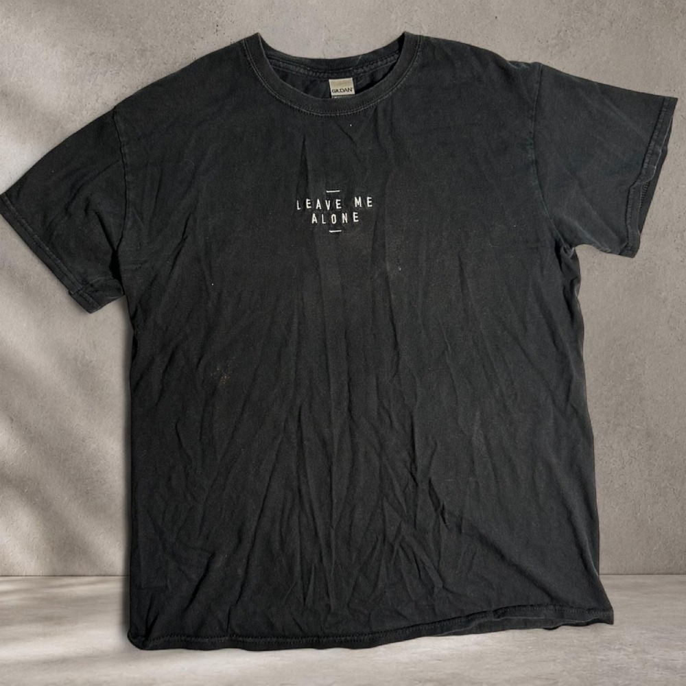 black "leave me alone" tee